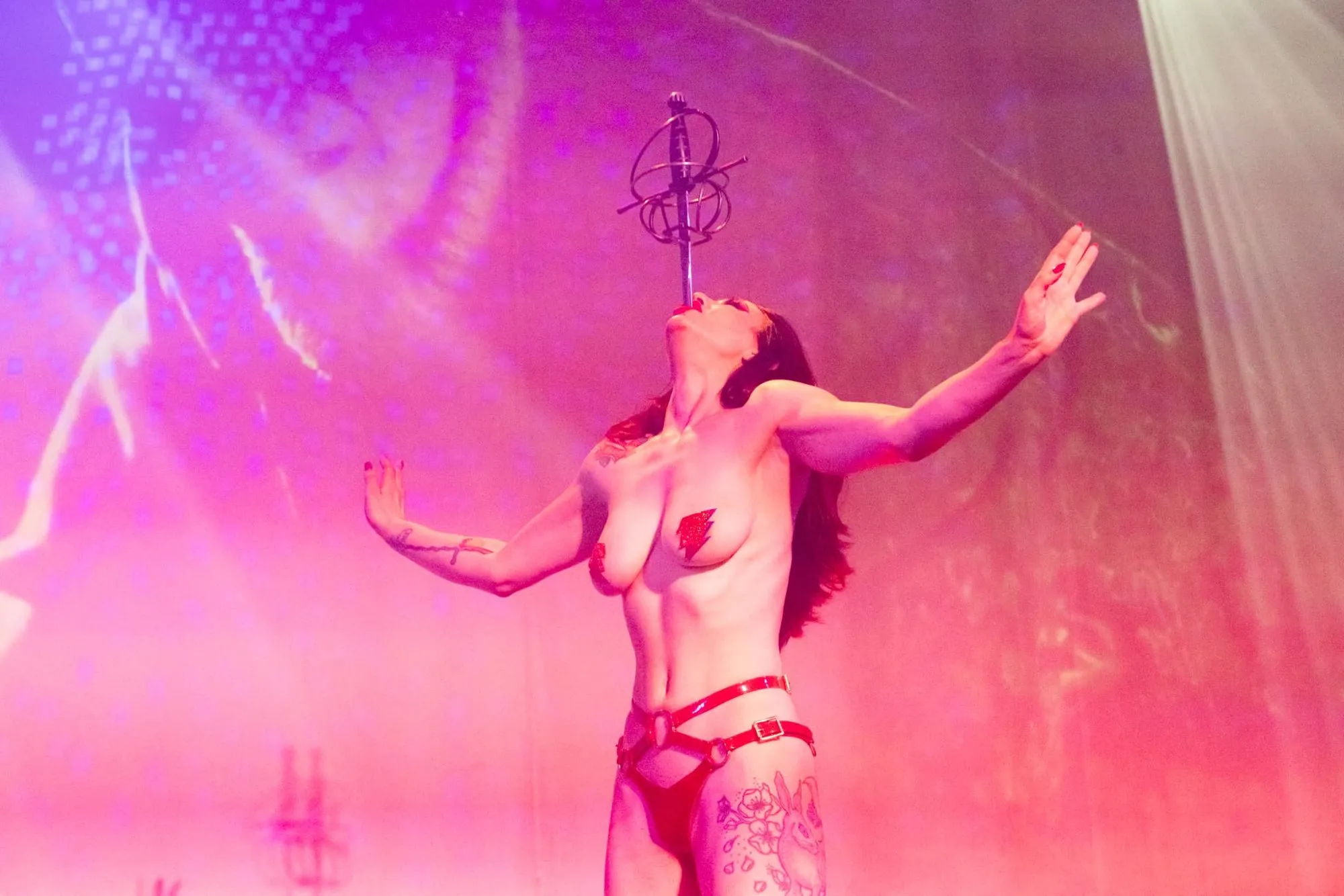 Sally Marvel swallowing a sword, Bowie Ball 2024